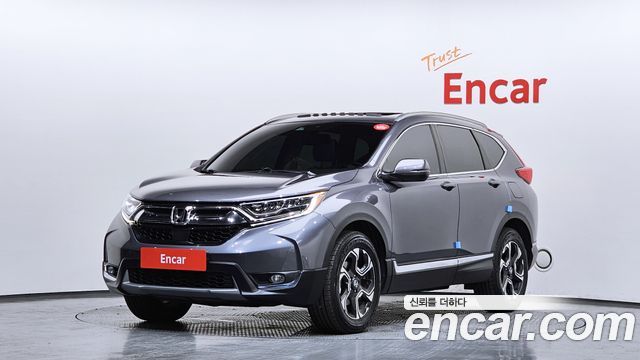 Honda CR-V 5-го поколения 1.5 Touring 4WD - фото 0