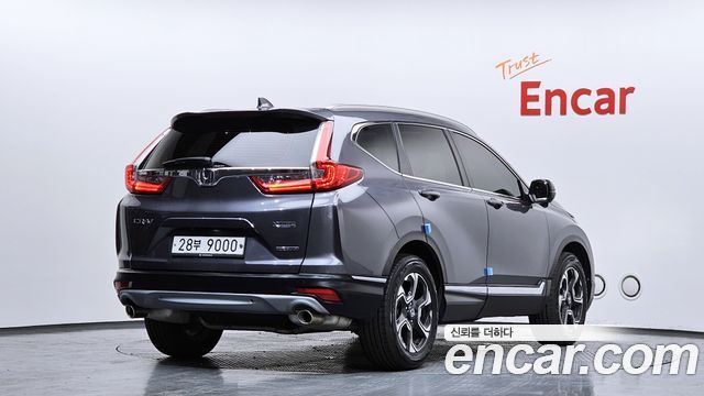 Honda CR-V 5-го поколения 1.5 Touring 4WD - фото 1