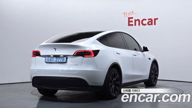 Tesla Model Y Long Range AWD - фото 1