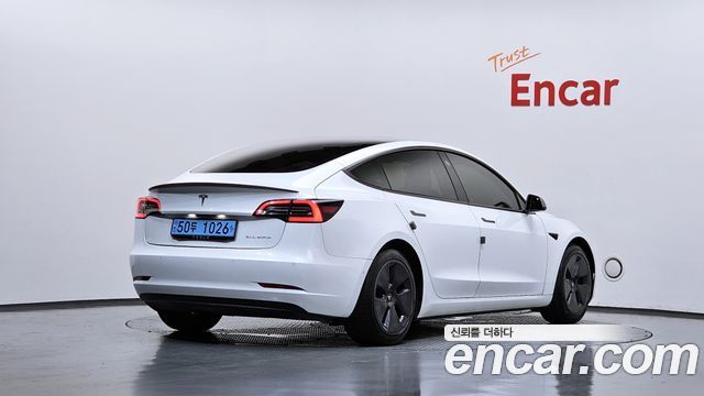 Tesla Model 3 Long Range AWD - фото 1