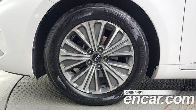Kia K7 Premier, гибрид Signature - фото 4