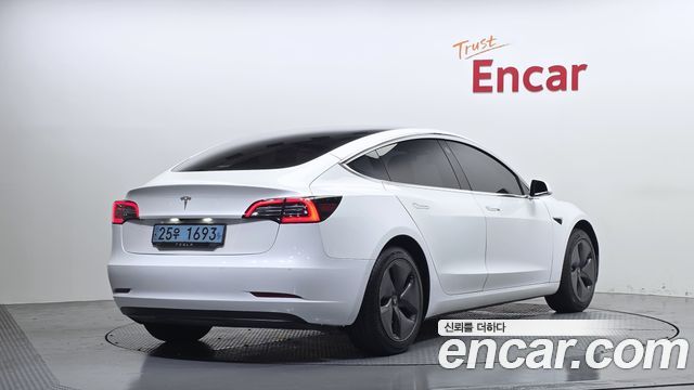 Tesla Model 3 Standard Range Plue RWD - фото 1