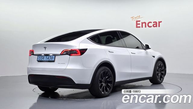 Tesla Model Y Long Range AWD - фото 1