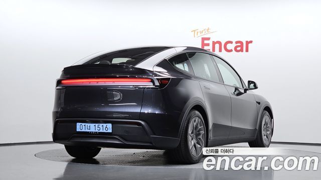 Tesla Model Y L Long Range AWD - фото 1