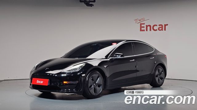 Tesla Model 3 Standard Range Plue RWD - фото 0