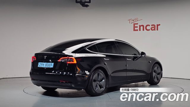 Tesla Model 3 Standard Range Plue RWD - фото 1
