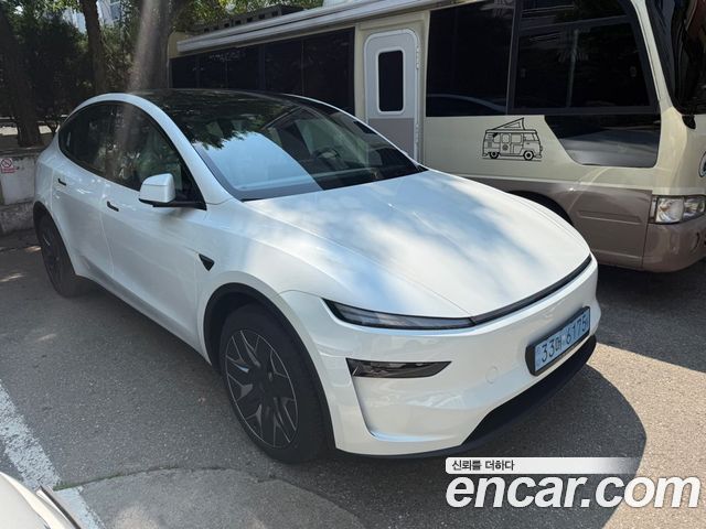 Tesla Model Y L Long Range AWD - фото 1