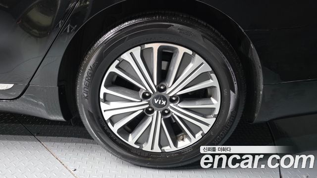 Kia K7 Premier, гибрид Signature - фото 4
