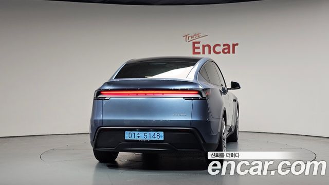 Tesla Model Y Long Range AWD - фото 2