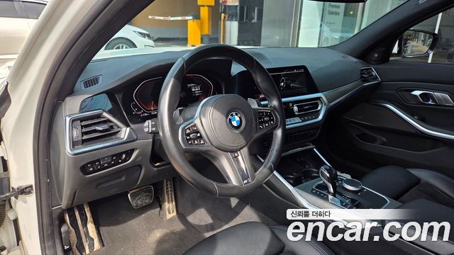 BMW 3-Series G20 320i M Sport - фото 1