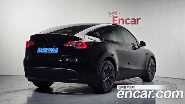 Tesla Model Y Long Range AWD - фото 1