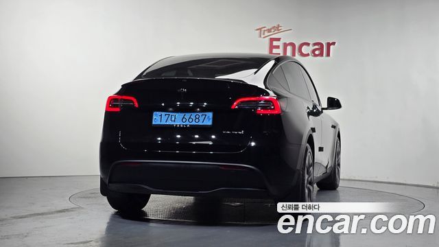 Tesla Model Y Long Range AWD - фото 3