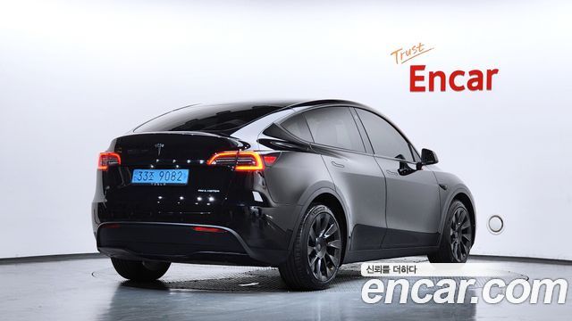 Tesla Model Y Long Range AWD - фото 1