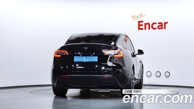 Tesla Model Y Long Range AWD - фото 3