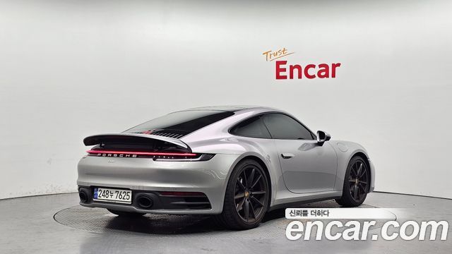 Porsche 911 Carrera 4 - фото 1