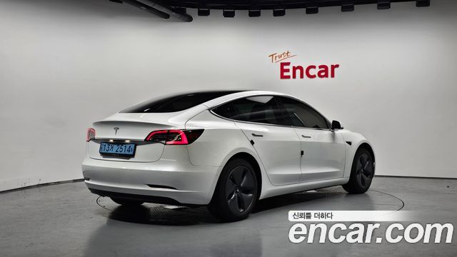 Tesla Model 3 Standard Range Plue RWD - фото 1