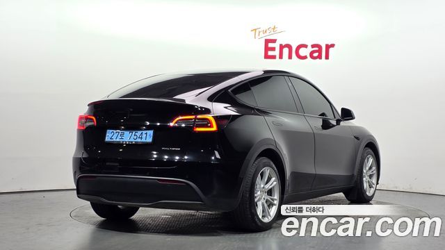Tesla Model Y Long Range AWD - фото 1