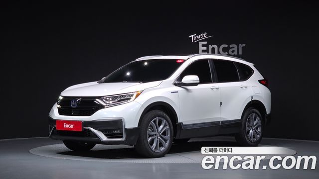 Honda CR-V 5-го поколения 2.0 Hybrid Touring 4WD - фото 0