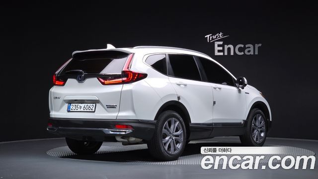 Honda CR-V 5-го поколения 2.0 Hybrid Touring 4WD - фото 1
