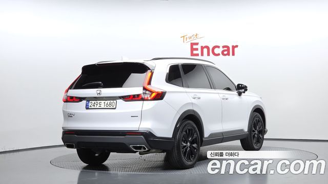 Honda CR-V 6-го поколения 2.0 Hybrid Touring 4WD - фото 1