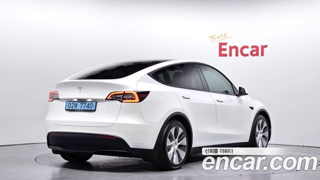 Tesla Model Y Long Range AWD - фото 1