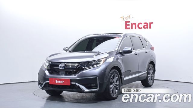 Honda CR-V 5-го поколения 2.0 Hybrid Touring 4WD - фото 0