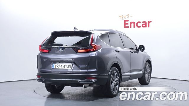 Honda CR-V 5-го поколения 2.0 Hybrid Touring 4WD - фото 1