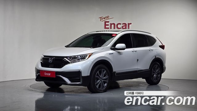 Honda CR-V 5-го поколения 2.0 Hybrid Touring 4WD - фото 0