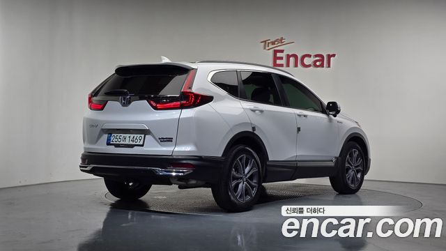 Honda CR-V 5-го поколения 2.0 Hybrid Touring 4WD - фото 1