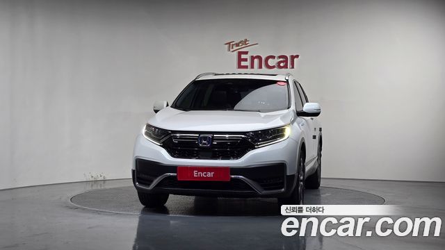 Honda CR-V 5-го поколения 2.0 Hybrid Touring 4WD - фото 2