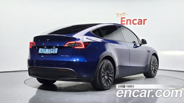 Tesla Model Y Long Range AWD - фото 1