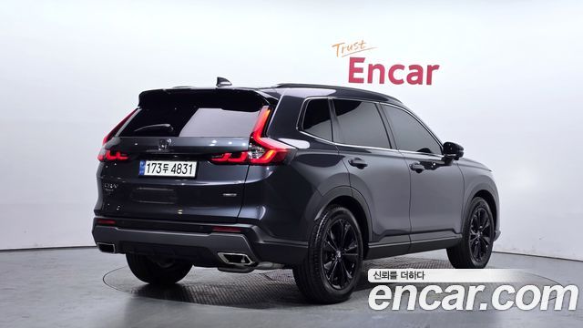 Honda CR-V 6-го поколения 2.0 Hybrid Touring 2WD - фото 1