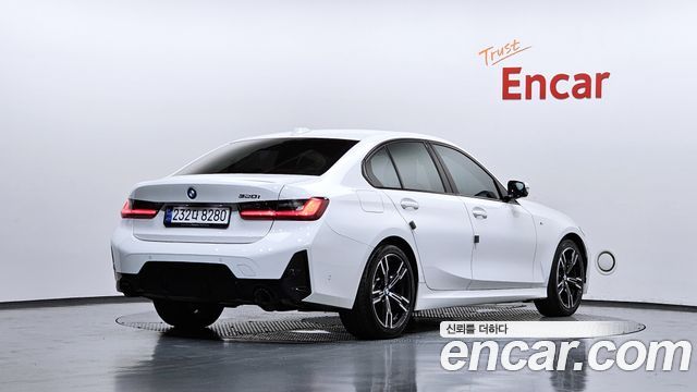 BMW 3-Series G20 320i M Sport - фото 1