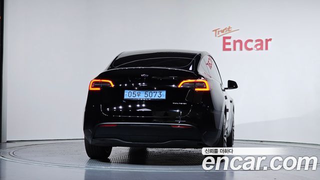 Tesla Model Y Long Range AWD - фото 3