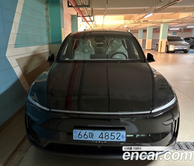 Tesla Model Y L Long Range AWD - фото 1