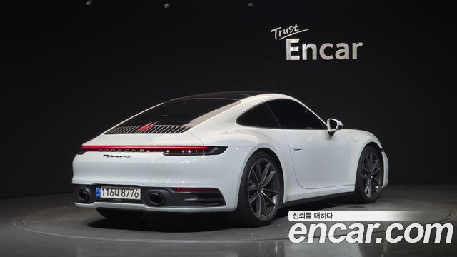 Porsche 911 Carrera 4 - фото 1