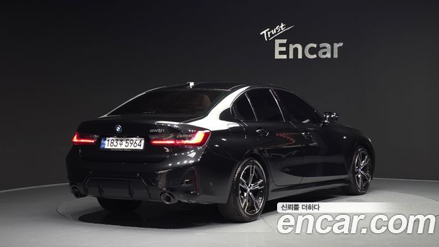 BMW 3-Series G20 320i M Sport - фото 1