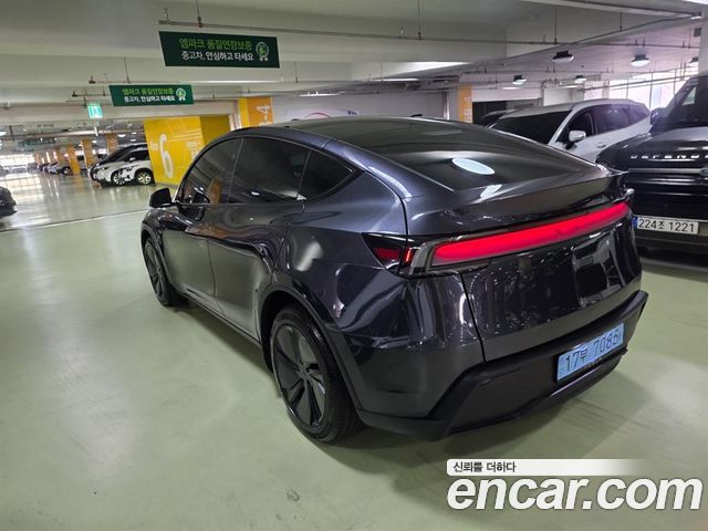 Tesla Model Y RWD - фото 2