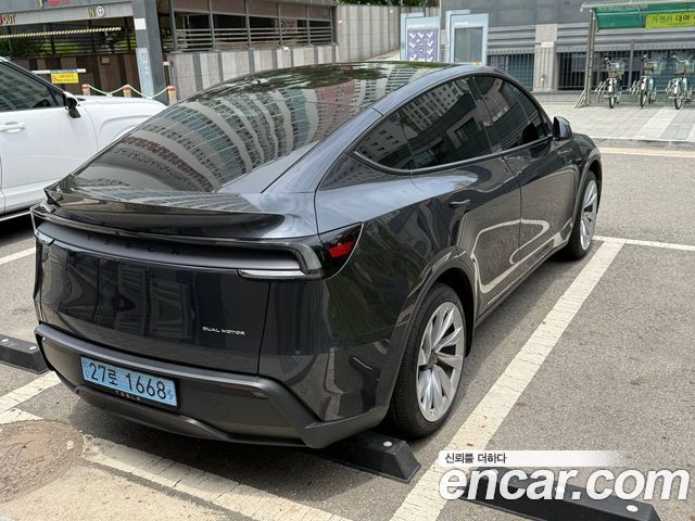 Tesla Model Y Long Range AWD - фото 1