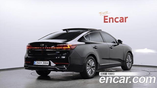 Kia K7 Premier, гибрид Signature - фото 1