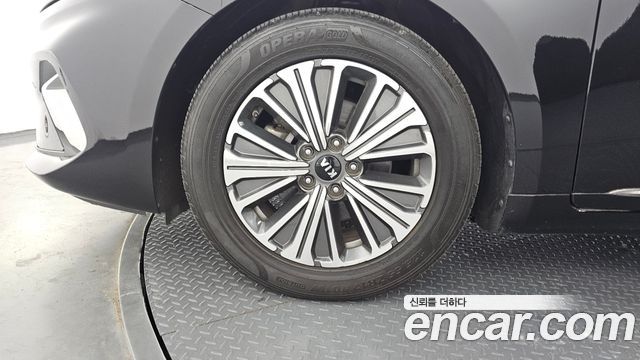 Kia K7 Premier, гибрид Signature - фото 4