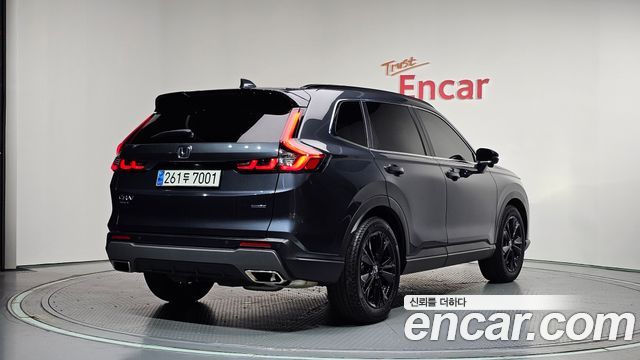 Honda CR-V 6-го поколения 2.0 Hybrid Touring 2WD - фото 1