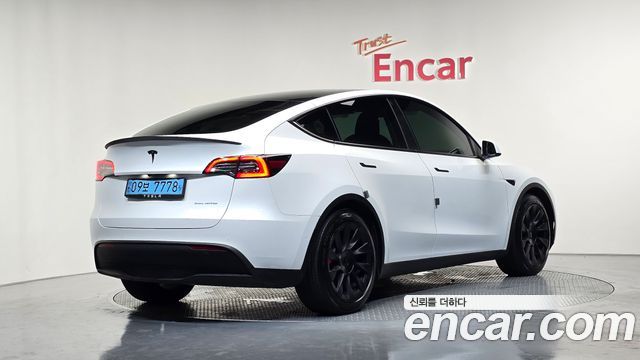 Tesla Model Y Long Range AWD - фото 1