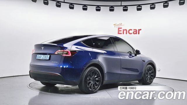 Tesla Model Y Long Range AWD - фото 1
