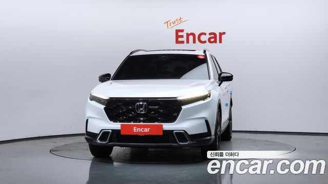 Honda CR-V 6-го поколения 2.0 Hybrid Touring 2WD - фото 2