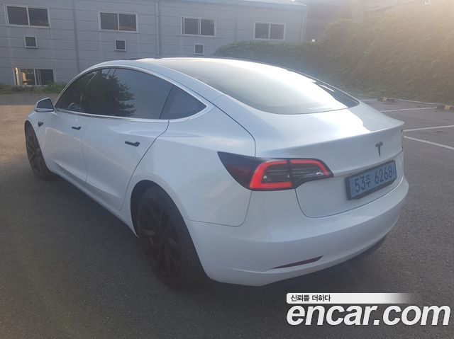 Tesla Model 3 Standard Range Plue RWD - фото 1