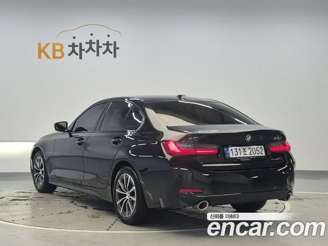 BMW 3-Series G20 320i - фото 1
