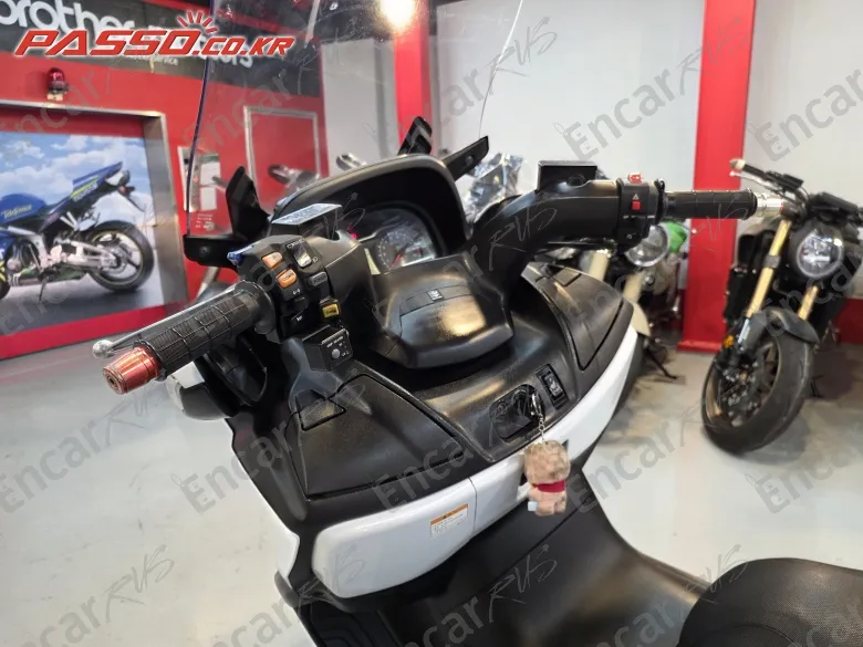 Suzuki Burgman 650 Executive - фото 3