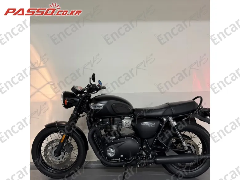 Triumph Bonneville T100 - фото 1